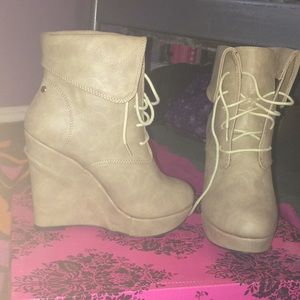 Wedged combat style booties.